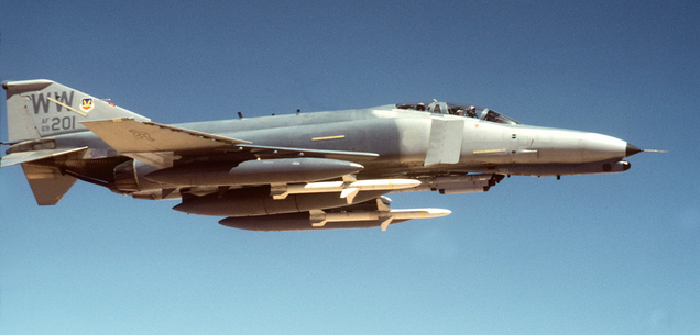 Two U.S. Air Force 35th Tactical Fighter Wing An F-4G “Wild Weasel” from the US Air Force 35th Tactical Fighter Wing armed with AGM-88 high speed anti-radiation missies aircraft flies over the Saudi desert Operation Desert Shield in January 1991. (US Air Force)